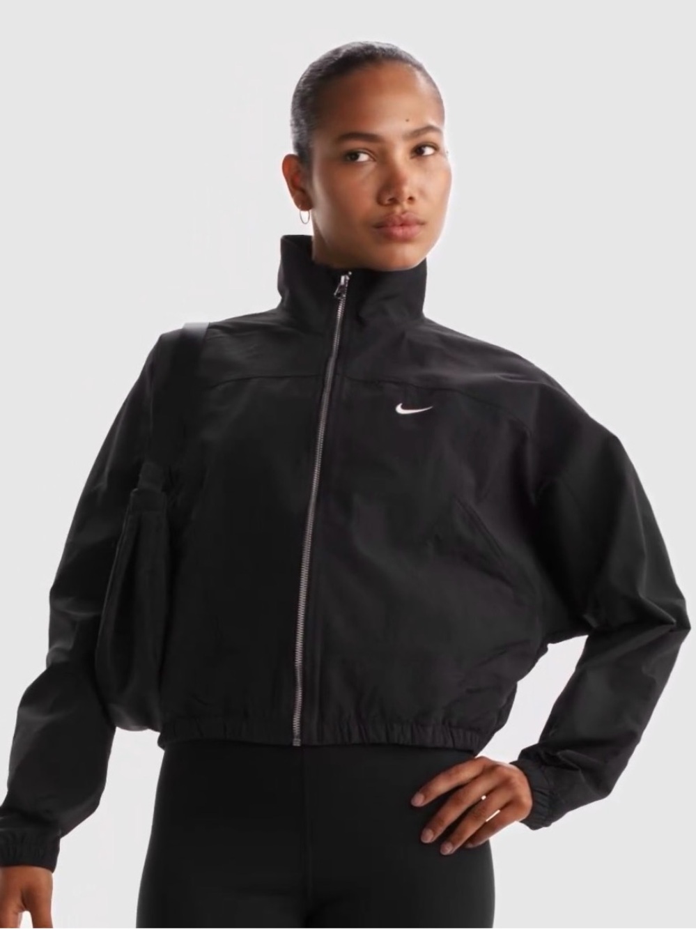 Women’s Nike size medium waterproof windbreaker sports jacket